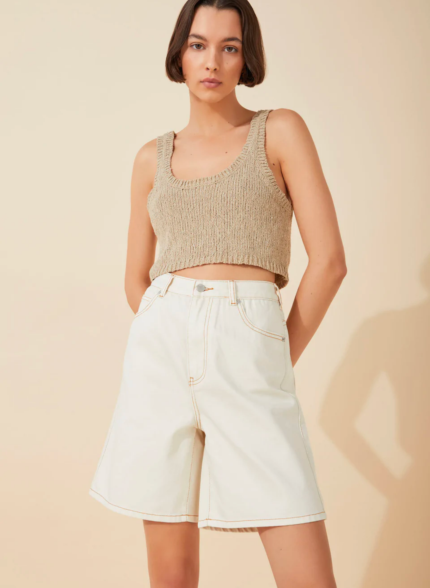 The Husk Textured Cotton Blend Knit Tank by Zulu & Zephyr is spun from a boucle textured, BCI-certified cotton blend yarn. Featuring a scoop neckline and loose cut, this piece is a wardrobe staple that can be styled with a myriad of looks.