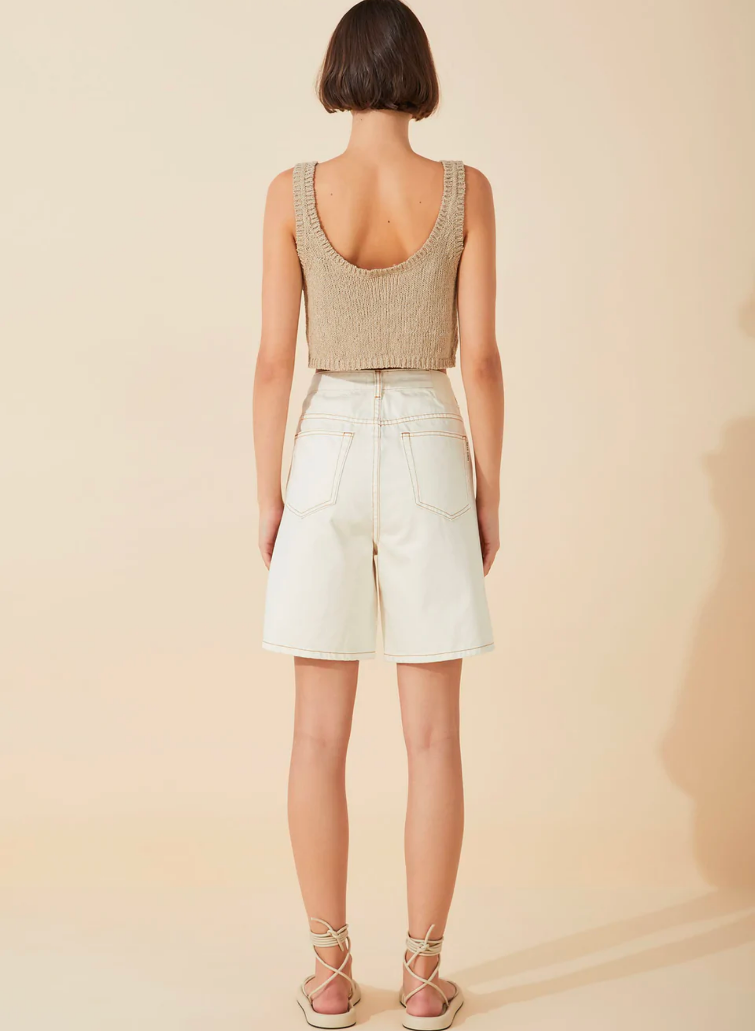 The Husk Textured Cotton Blend Knit Tank by Zulu & Zephyr is spun from a boucle textured, BCI-certified cotton blend yarn. Featuring a scoop neckline and loose cut, this piece is a wardrobe staple that can be styled with a myriad of looks.