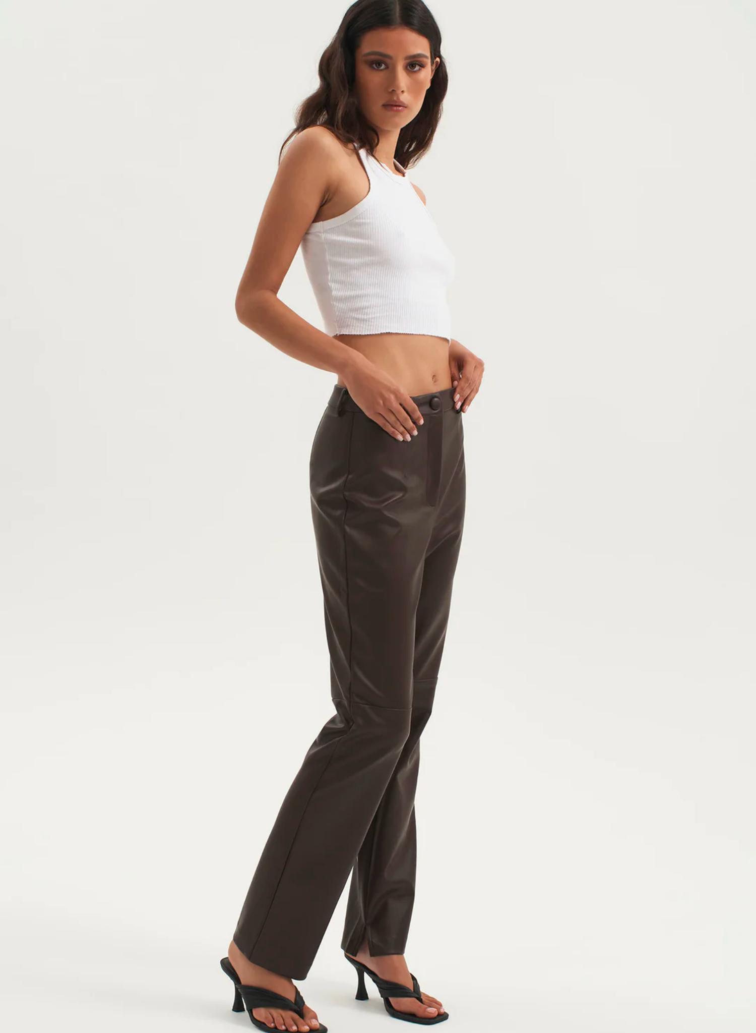 The Lexi Pant is a classic cut high waisted and cropped leg fit. The soft faux leather fabric is comfy and durable, featuring an above knee seam that ensures they bend and stretch as you do. This is the perfect new staple for your wardrobe.