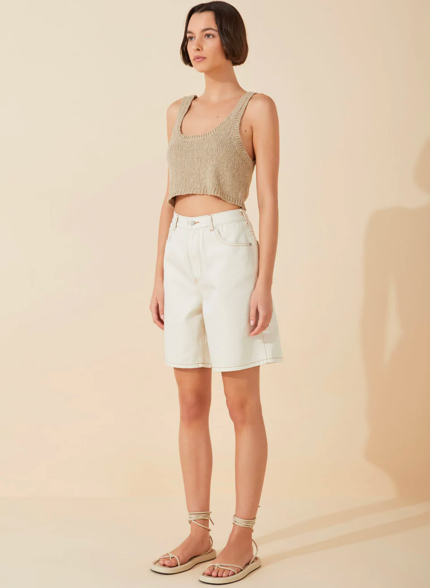 The Husk Textured Cotton Blend Knit Tank by Zulu & Zephyr is spun from a boucle textured, BCI-certified cotton blend yarn. Featuring a scoop neckline and loose cut, this piece is a wardrobe staple that can be styled with a myriad of looks.