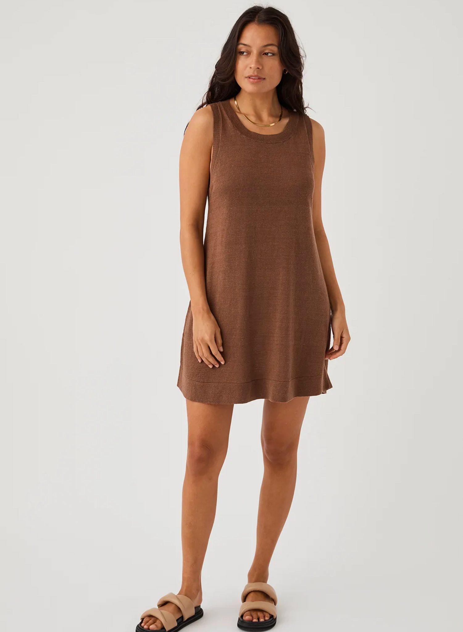 Brie Shift Dress in Chocolate. 100% Linen Knit Shift shape Wide crew neck Mini dress style Zero waste knit construction Soft hand feel Ethically produced Free of harmful chemicals : OEKO-TEX Standard 100 This piece is of 100% natural linen, carefully knitted with zero waste. With this is mind, this item appreciates good care so it can be enjoyed for seasons to come.