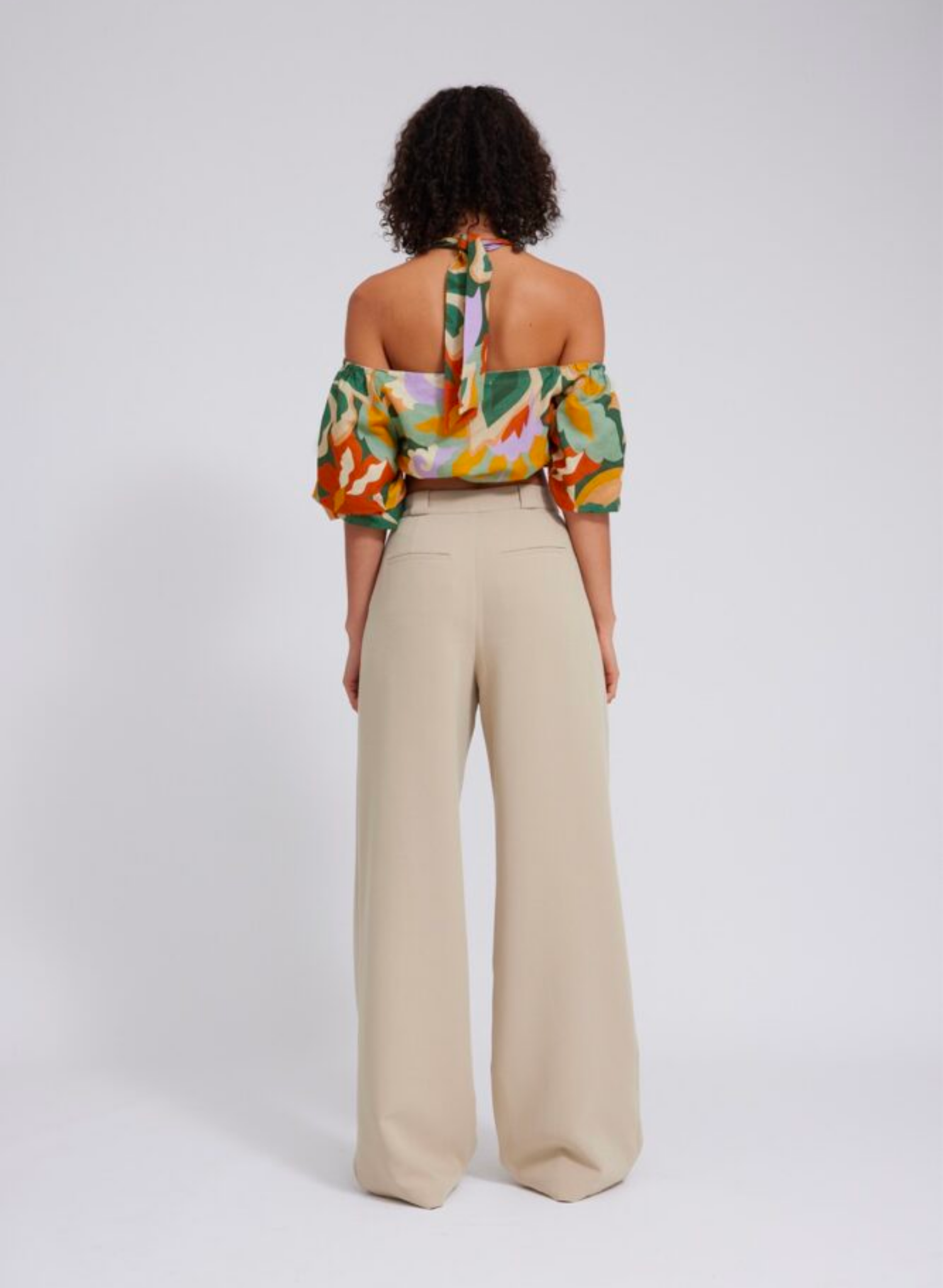 Full length slouchy style suit pant Thick suiting fabrication Designed to be a wide straight leg Waist beltloop tuck detail Pant is unlined Composition: 96% Polyester 4% Spandex