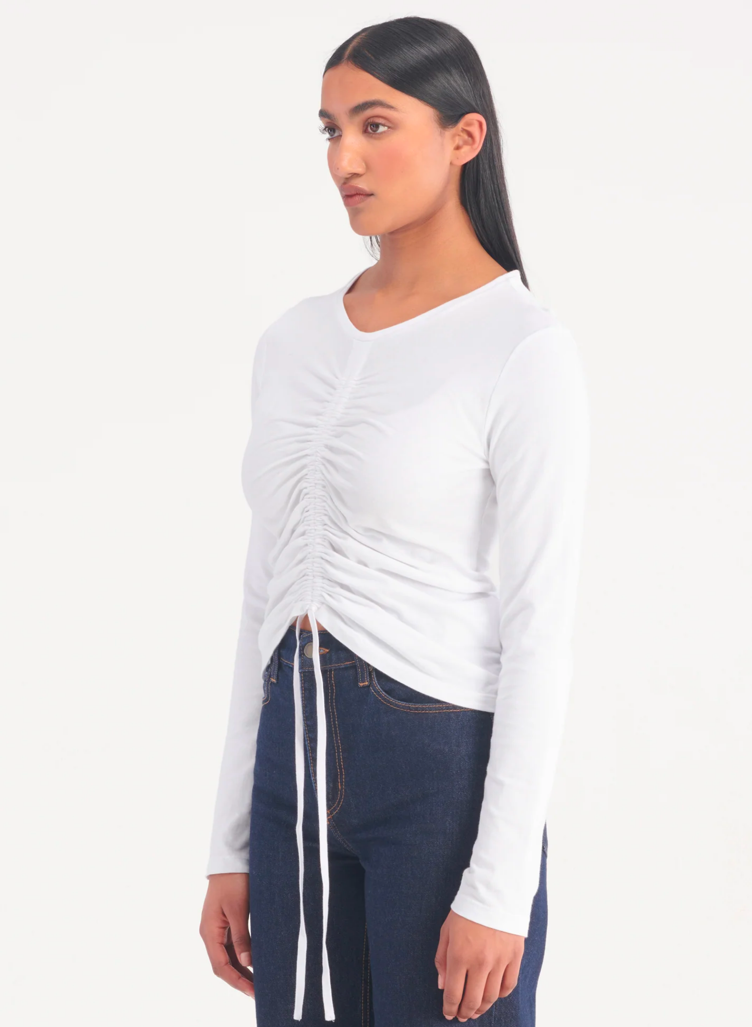 The Lezah Rouched Top features an elasticated drawstring at the centre front for adjustable gathering. The hem can be cinched up for an inverted hemline or relaxed for a straight silhouette. Crafted in lightweight, FibreTrace Good Earth Cotton Jersey, this versatile, long sleeve top is the perfect layering piece for any season.