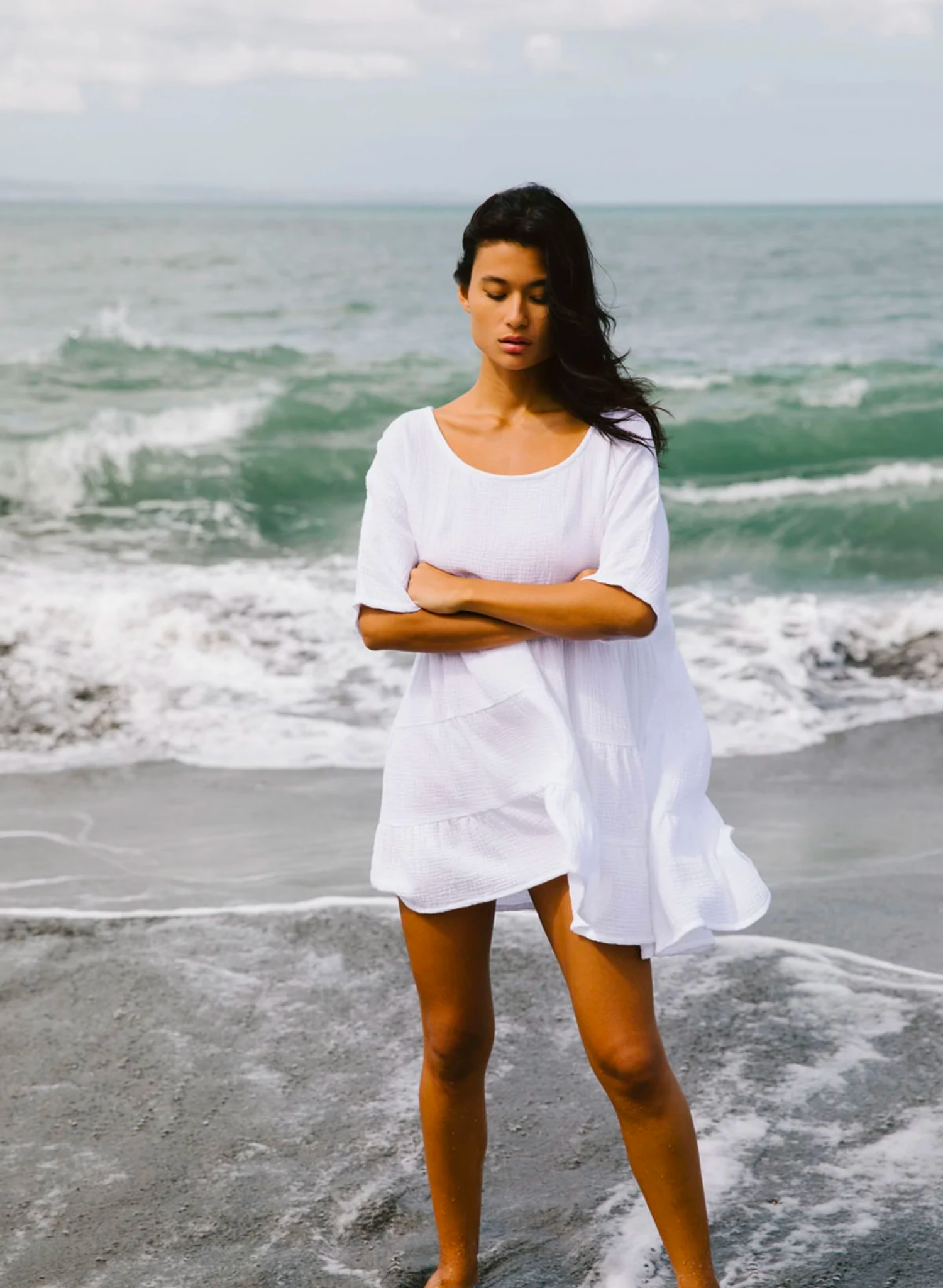 This oversized baby-doll is the perfect chuck on mini dress. Made from the softest natural cotton bubble, you will want to live in this dress all season long.Featuring a flattering scooped neckline a longer sleeve and a tiered baby doll skirt. Paired with sandals or heels it makes a cute day or night outfit.