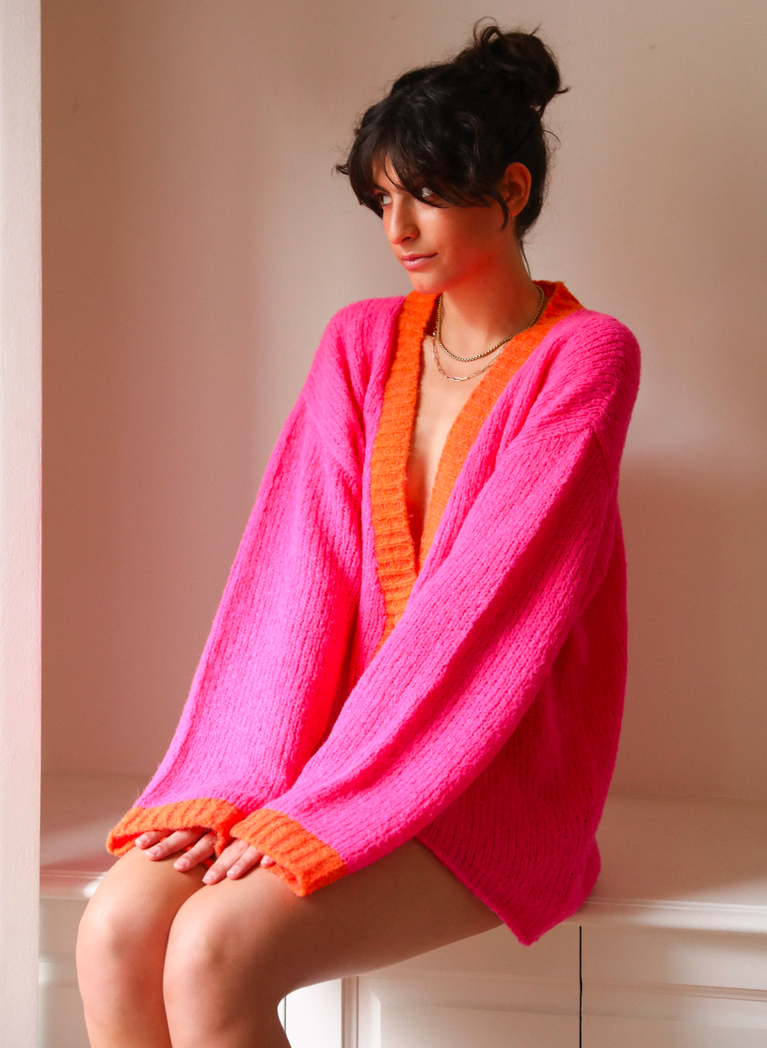 Blair Cardigan in Pink/Orange Colourway. The Winter staple you have been waiting for. A dream piece. Carefully crafted from the softest and most lightweight yarn. It is like wrapping yourself into a soft cloud.  Comfortable fit.  All Andean's beautiful pieces are hand-made with Love - measurements and colour may slightly vary.