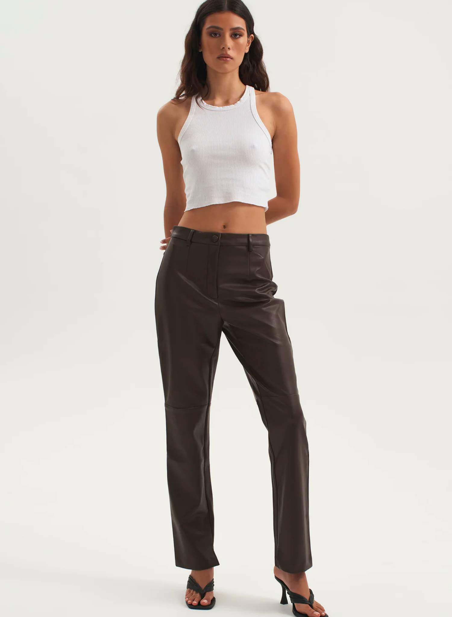 The Lexi Pant is a classic cut high waisted and cropped leg fit. The soft faux leather fabric is comfy and durable, featuring an above knee seam that ensures they bend and stretch as you do. This is the perfect new staple for your wardrobe.
