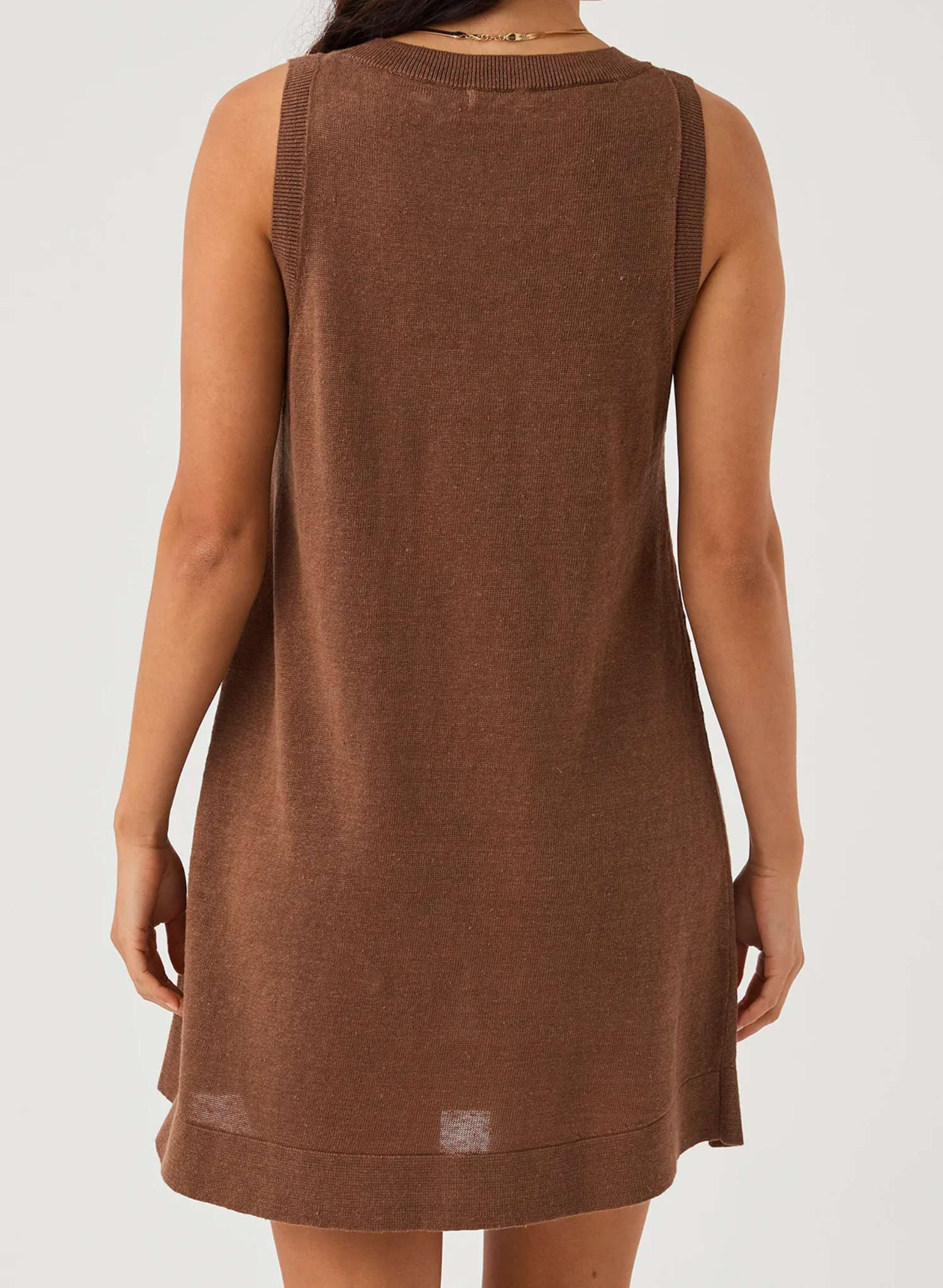 Brie Shift Dress in Chocolate. 100% Linen Knit Shift shape Wide crew neck Mini dress style Zero waste knit construction Soft hand feel Ethically produced Free of harmful chemicals : OEKO-TEX Standard 100 This piece is of 100% natural linen, carefully knitted with zero waste. With this is mind, this item appreciates good care so it can be enjoyed for seasons to come.