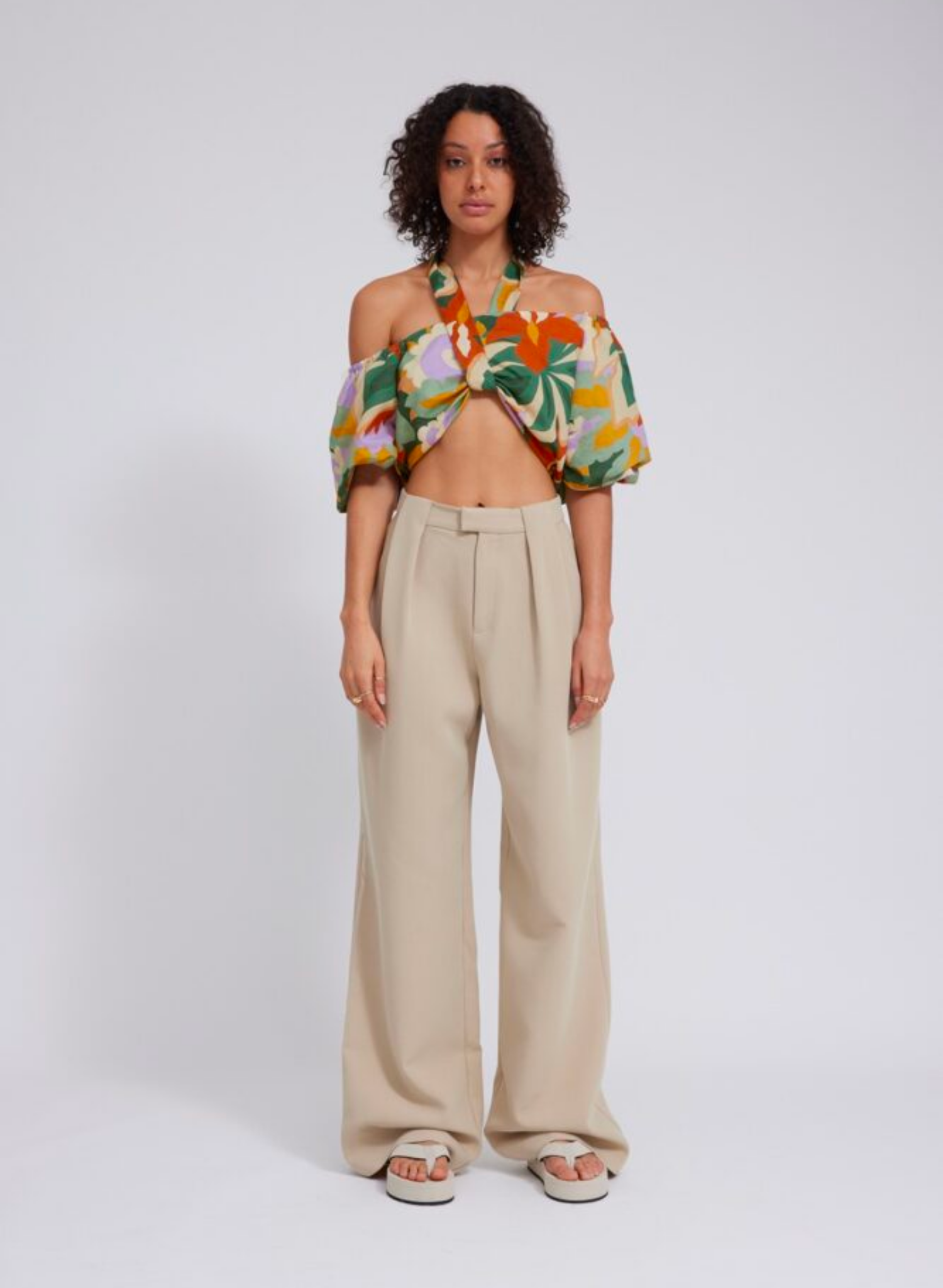 Full length slouchy style suit pant Thick suiting fabrication Designed to be a wide straight leg Waist beltloop tuck detail Pant is unlined Composition: 96% Polyester 4% Spandex