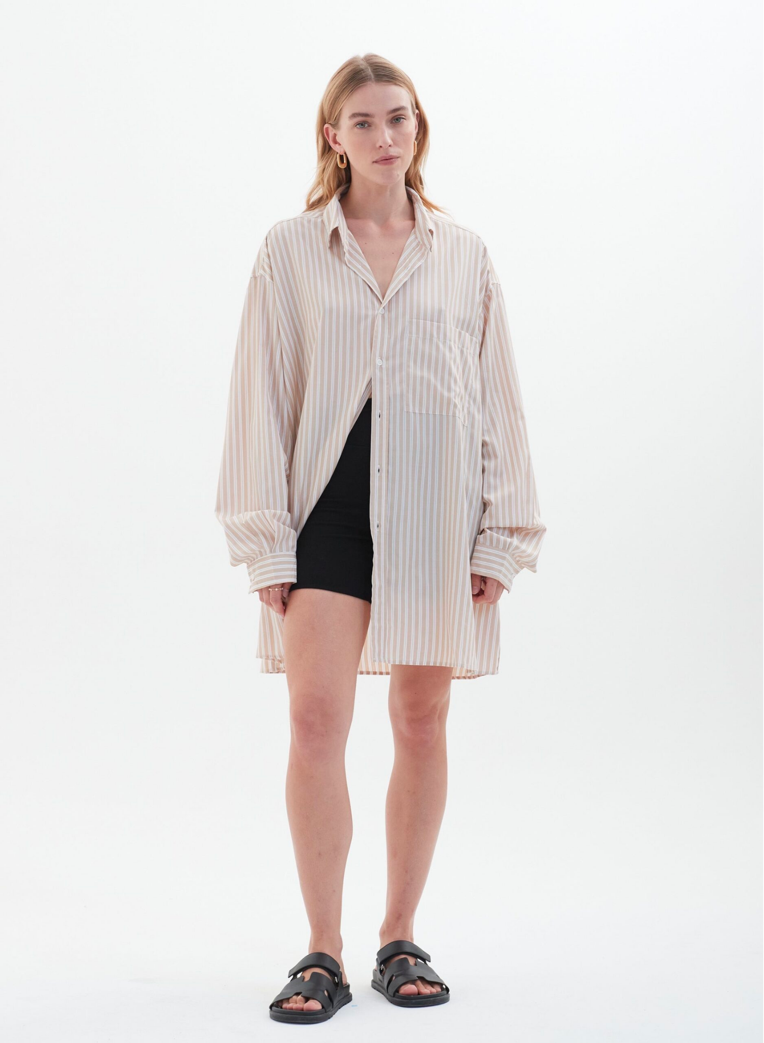 The Lucia Shirt is a nod to modern work shirting but with an oversized twist. The collared neckline, dropped shoulders, and long sleeves keep the embellishments to a minimal. Layer over a tee or style with tailored trousers to complement the piece’s casual aesthetic.