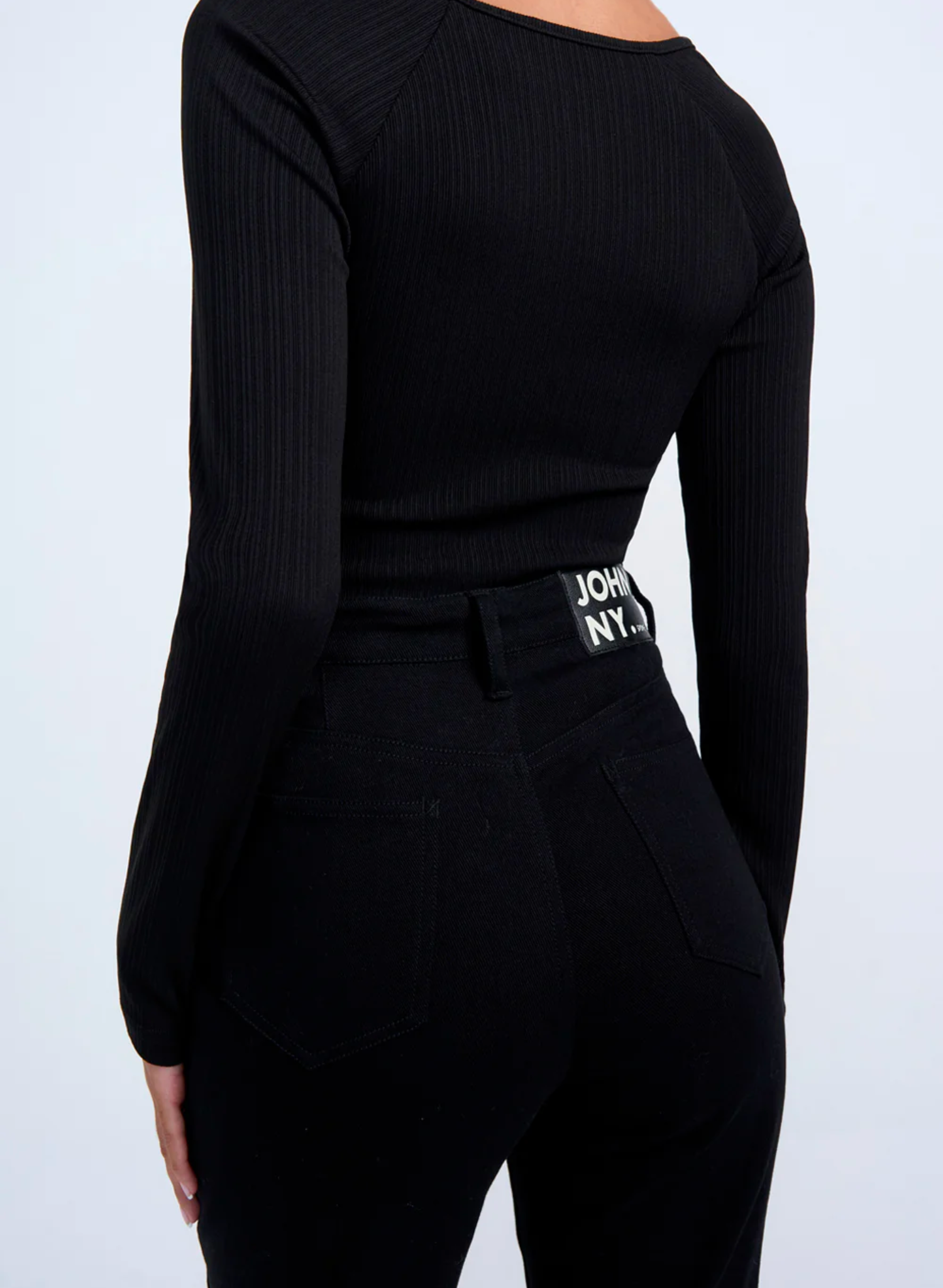 Wardrobe staples made simple with the Elsie Sleeve Rib Top. Crafted from a soft skinny rib jersey fabrication, this staple features a soft square neckline and bind detail on the neckline and arms. Complete your look with the Johnny Jean to transition between seasons.