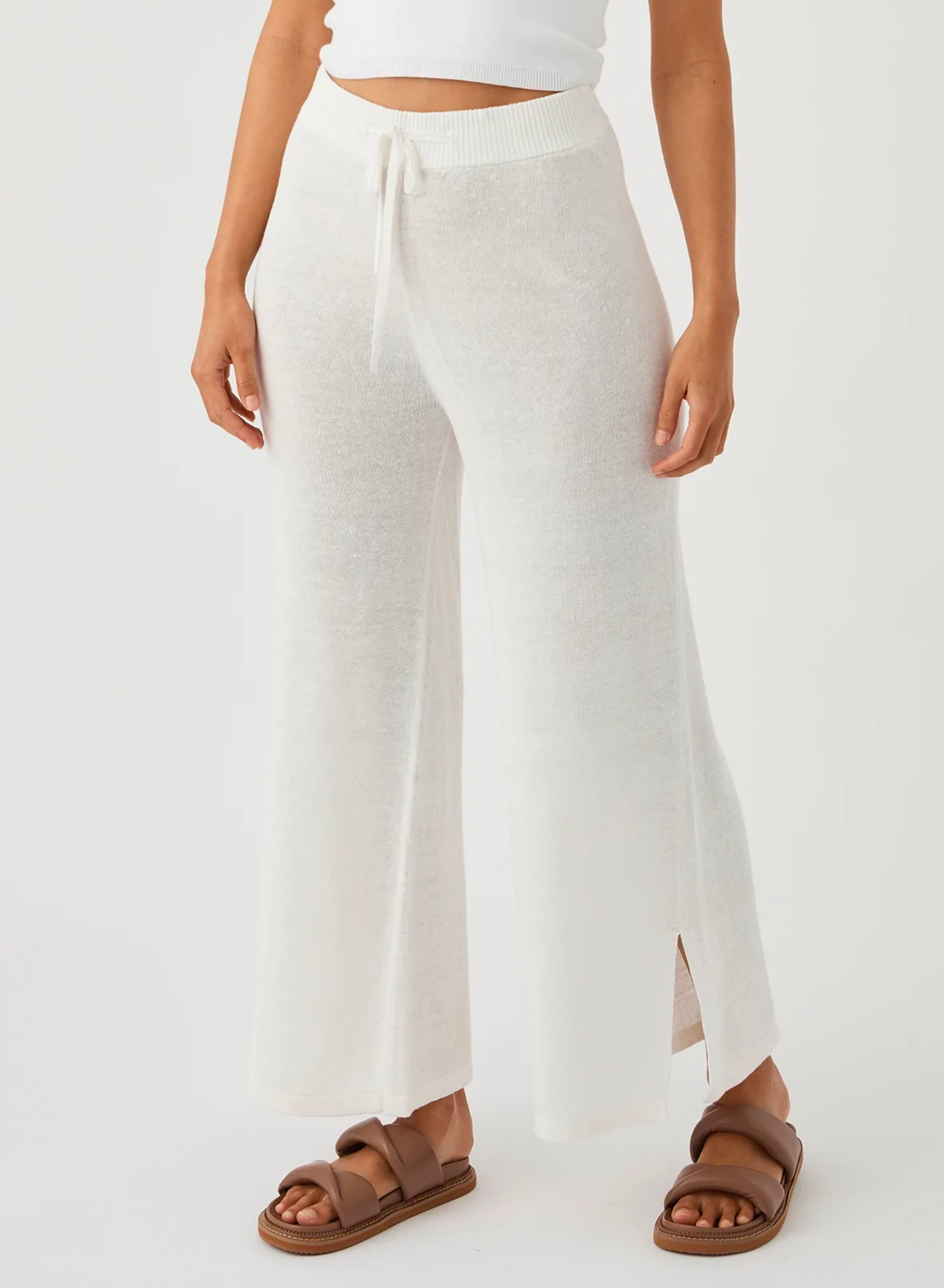 Brie Pant in Cream. 100% Linen knit. Drawcord and elastic waist Relaxed wide leg Slight cropped ankle length Split at ankle Zero waste knit construction Soft hand feel Ethically produced Free of harmful chemicals : OEKO-TEX Standard 100