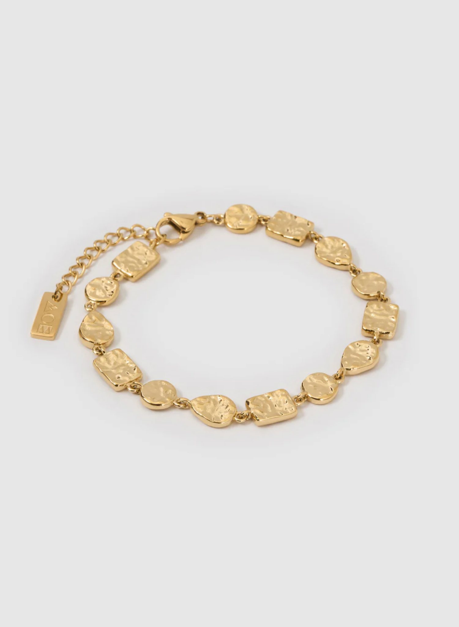Gold bracelet with heart-shaped links on a light gray background